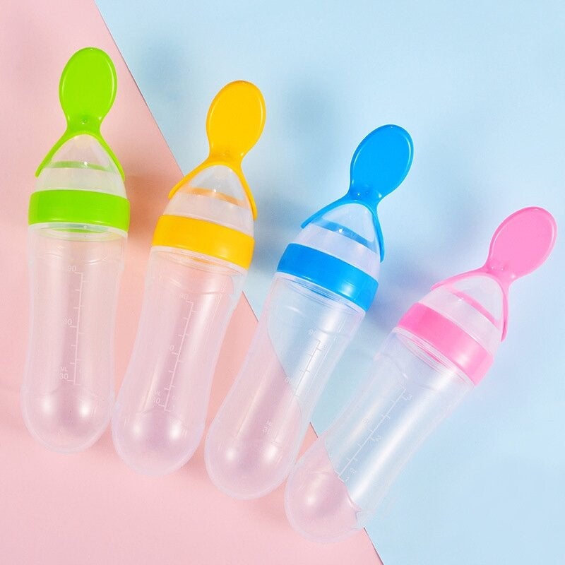 Infant Baby Squeezing Feeding Bottle With Spoon